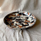 handmade ceramics, medium marbled bowl, beige black and terracotta merged, profile view