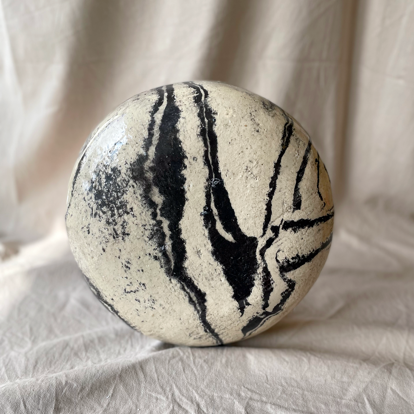 handmade ceramics, medium marbled bowl, beige and black,back side