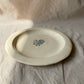 handmade ceramics, dinner plate with chicken pattern, profile angle